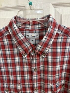 red and white plaid Carhartt short-sleeve button-down shirt.